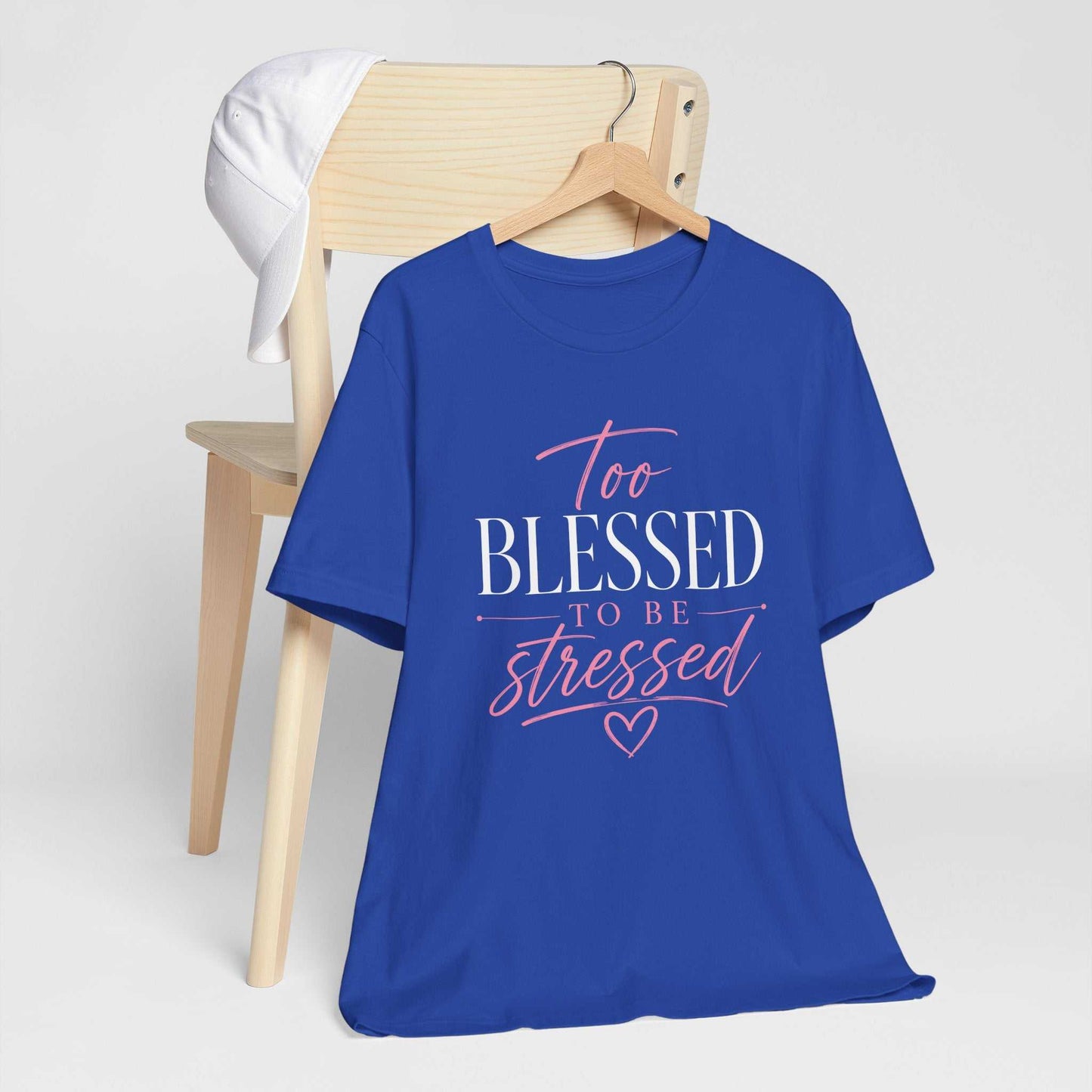 Too Blessed To Be Stressed unisex jersey tee with pink script and white lettering on dark shirt