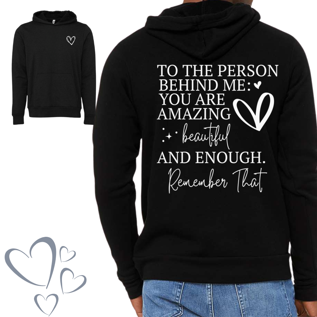 Cozy black hoodie with "To The Person Behind Me: You Are Amazing, Beautiful, and Enough" message.