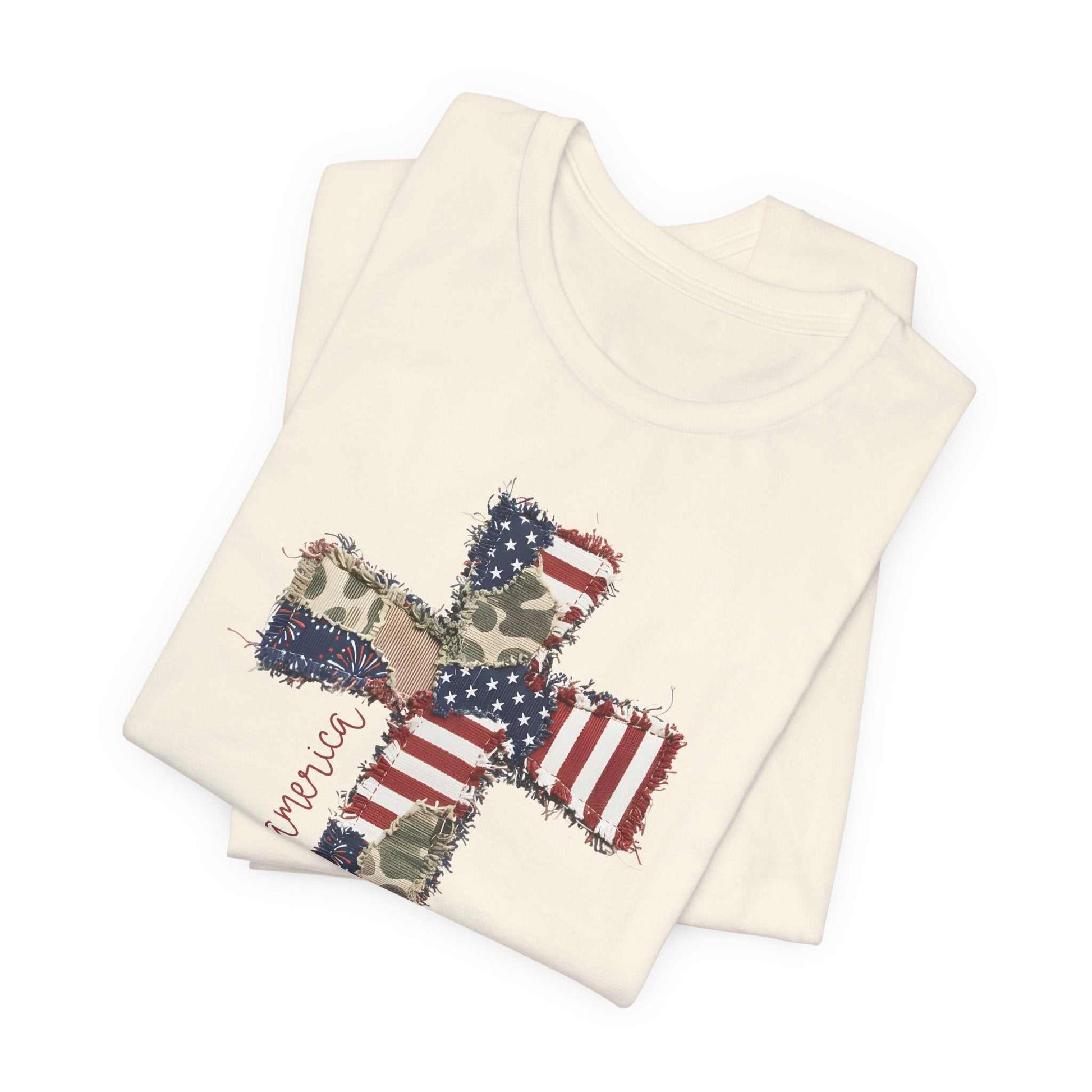 God Bless America shirt with patriotic cross and distressed American flag design from Wyoming Sunset Boutique