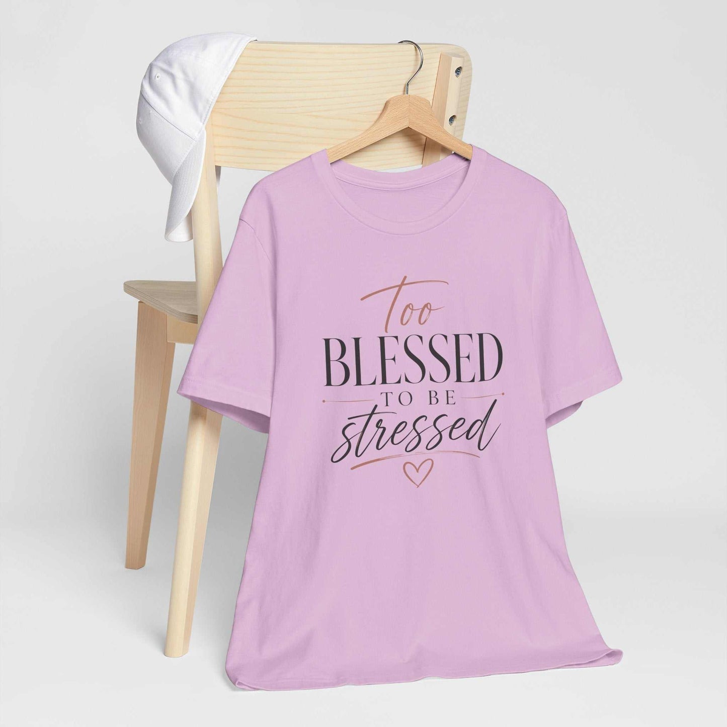 Too Blessed To Be Stressed unisex jersey tee with pink script and white lettering on dark fabric