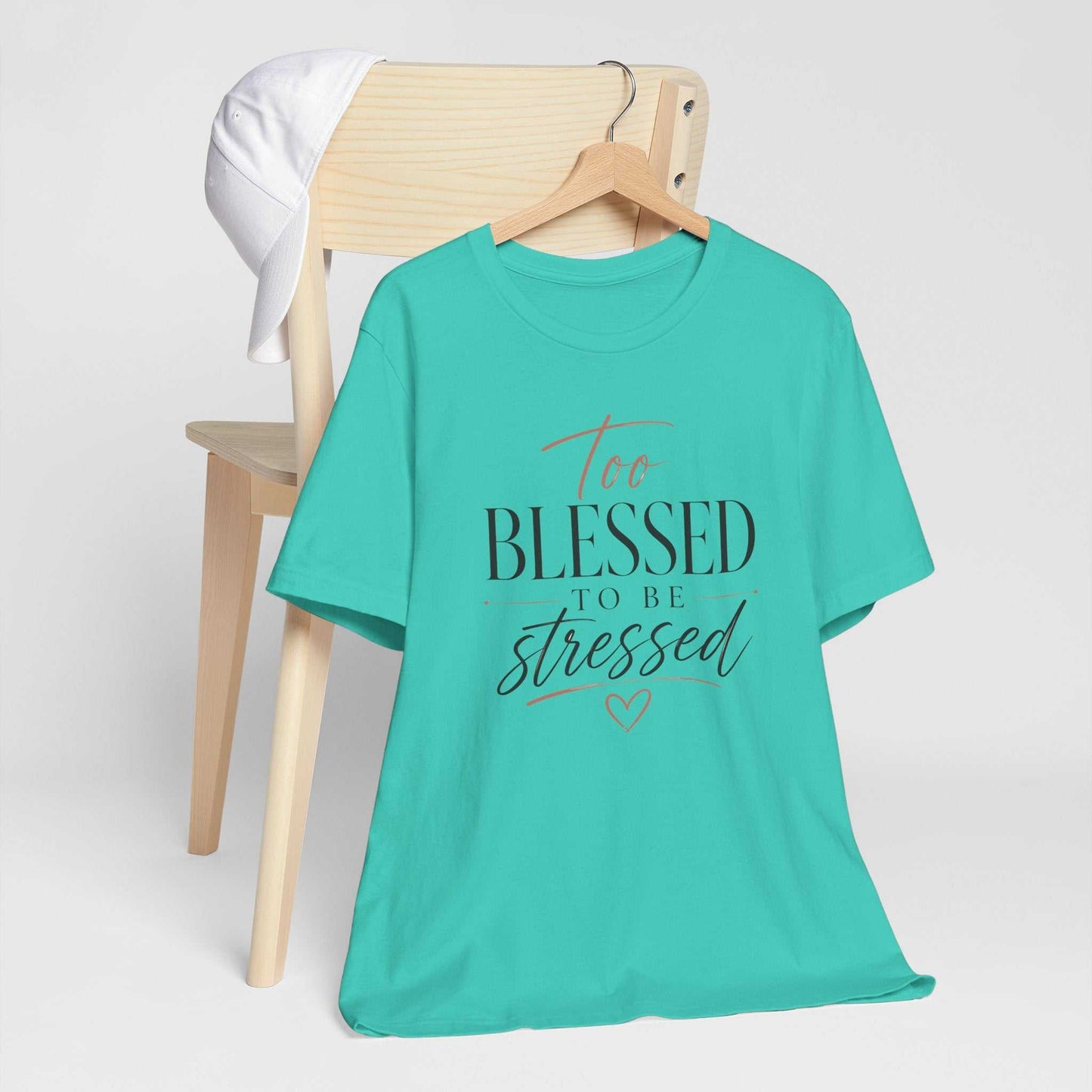 Too Blessed To Be Stressed unisex jersey tee with pink script and white lettering on dark fabric