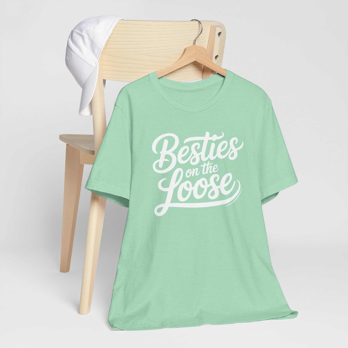 Woman wearing Besties on the Loose Tee, a soft Bella Canvas friendship t-shirt perfect for girls' trips and best friend gifts