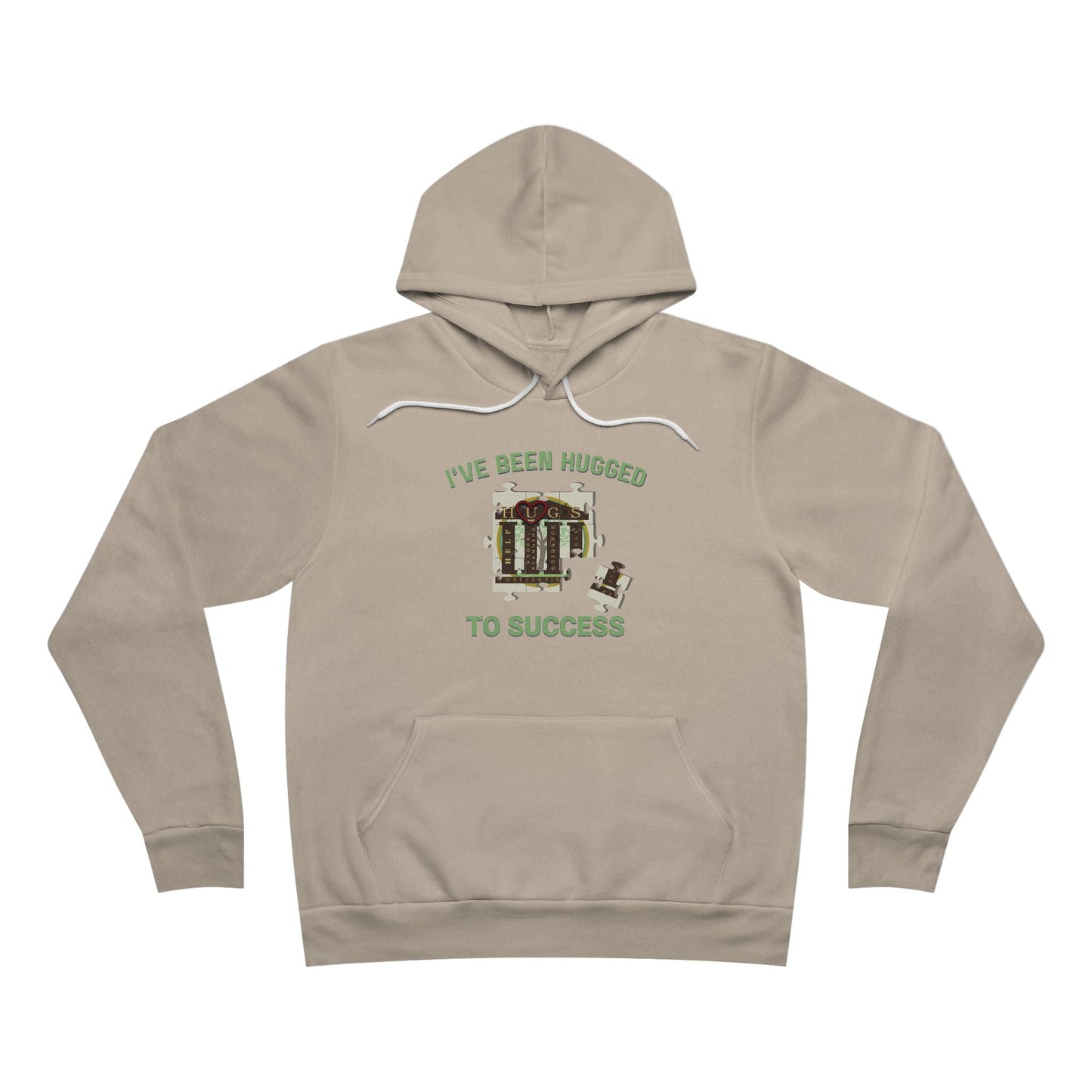 Black cozy "I've Been Hugged to Success Hoodie" with puzzle-piece design celebrating HUGS graduates' growth and connection