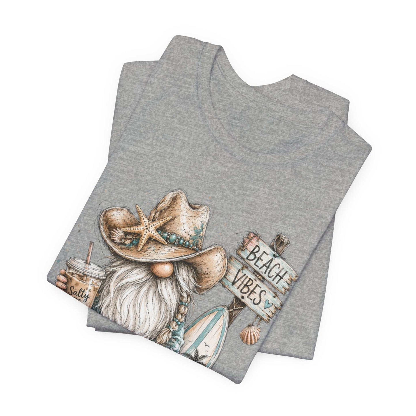 Coastal Cowgirl Beach Gnome shirt with turquoise accents, cowboy boots, and seashells in watercolor style