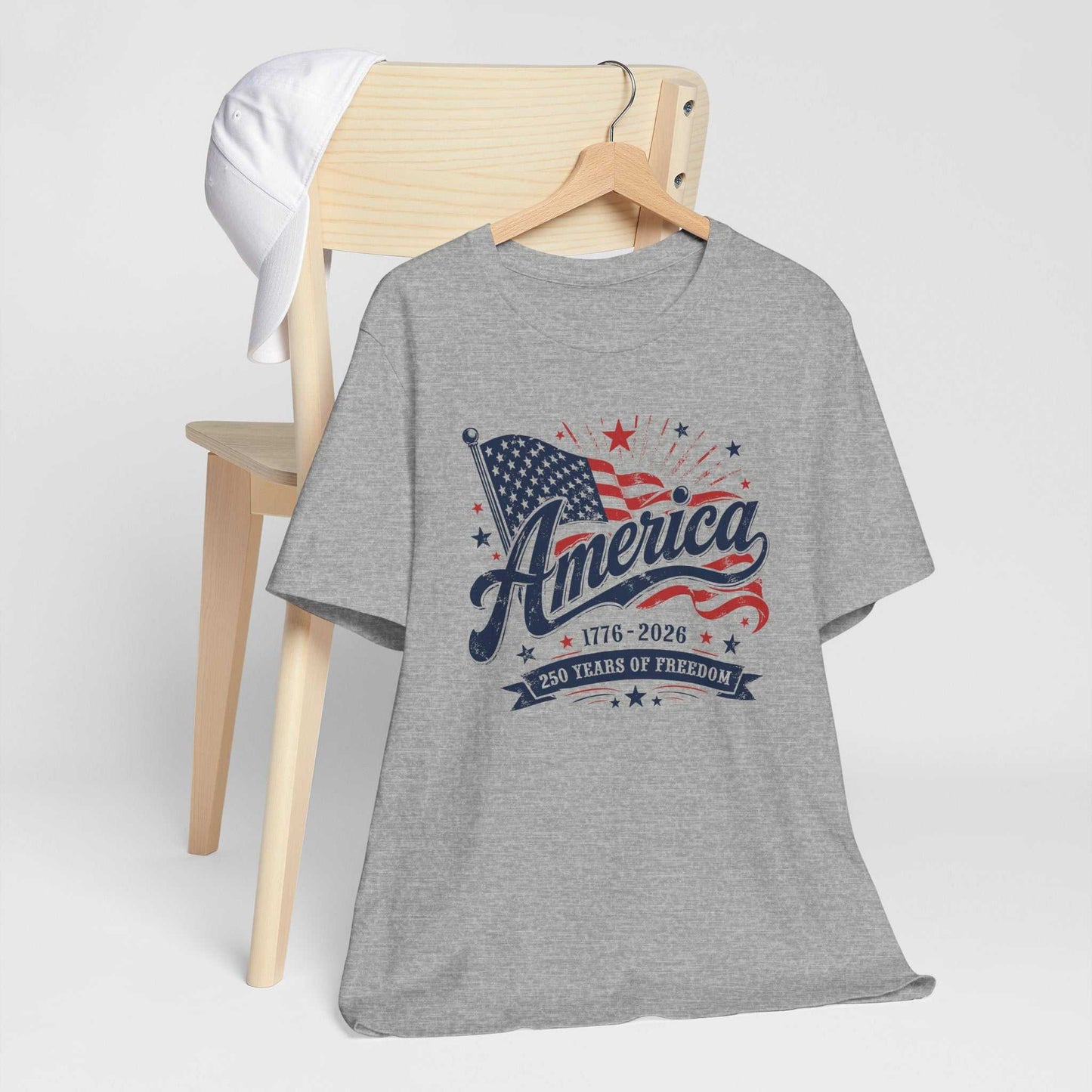America 250 Years of Freedom patriotic tee with vintage American flag and 1776–2026 dates in red, white, and blue design