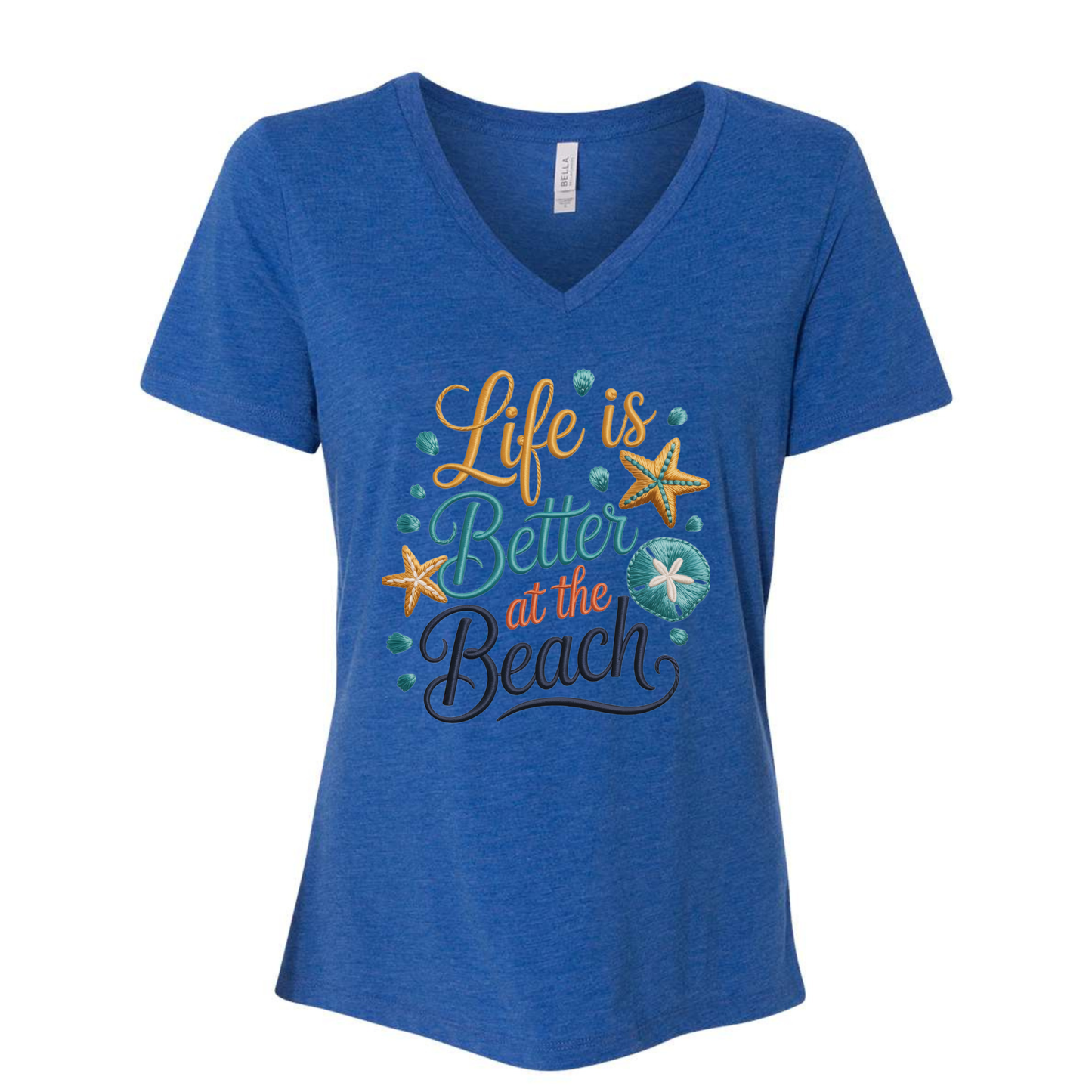 Women's V-neck tee with "Life Is Better at the Beach" faux cross-stitch design featuring seashells and coastal colors