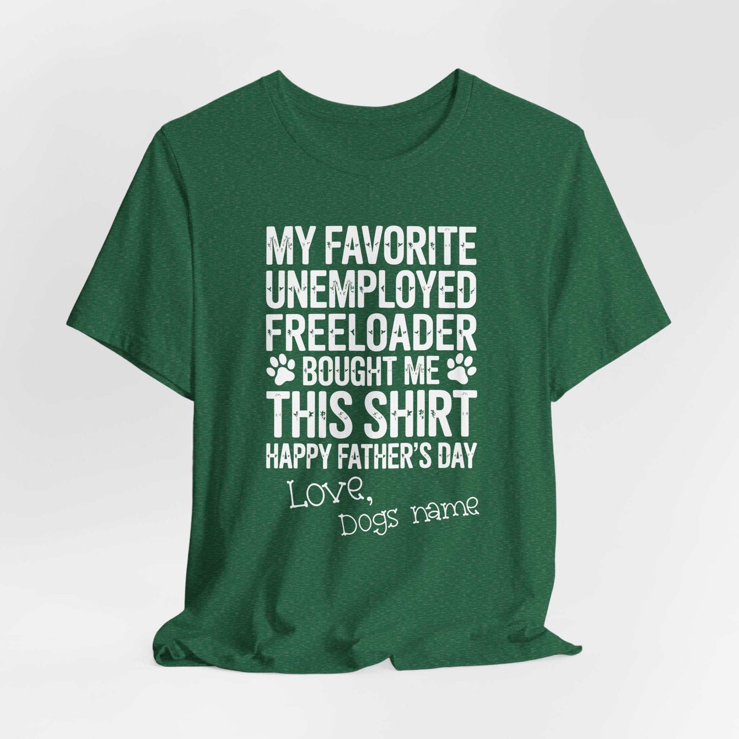 Man wearing funny dog dad shirt with paw prints and humorous text about unemployed freeloaders