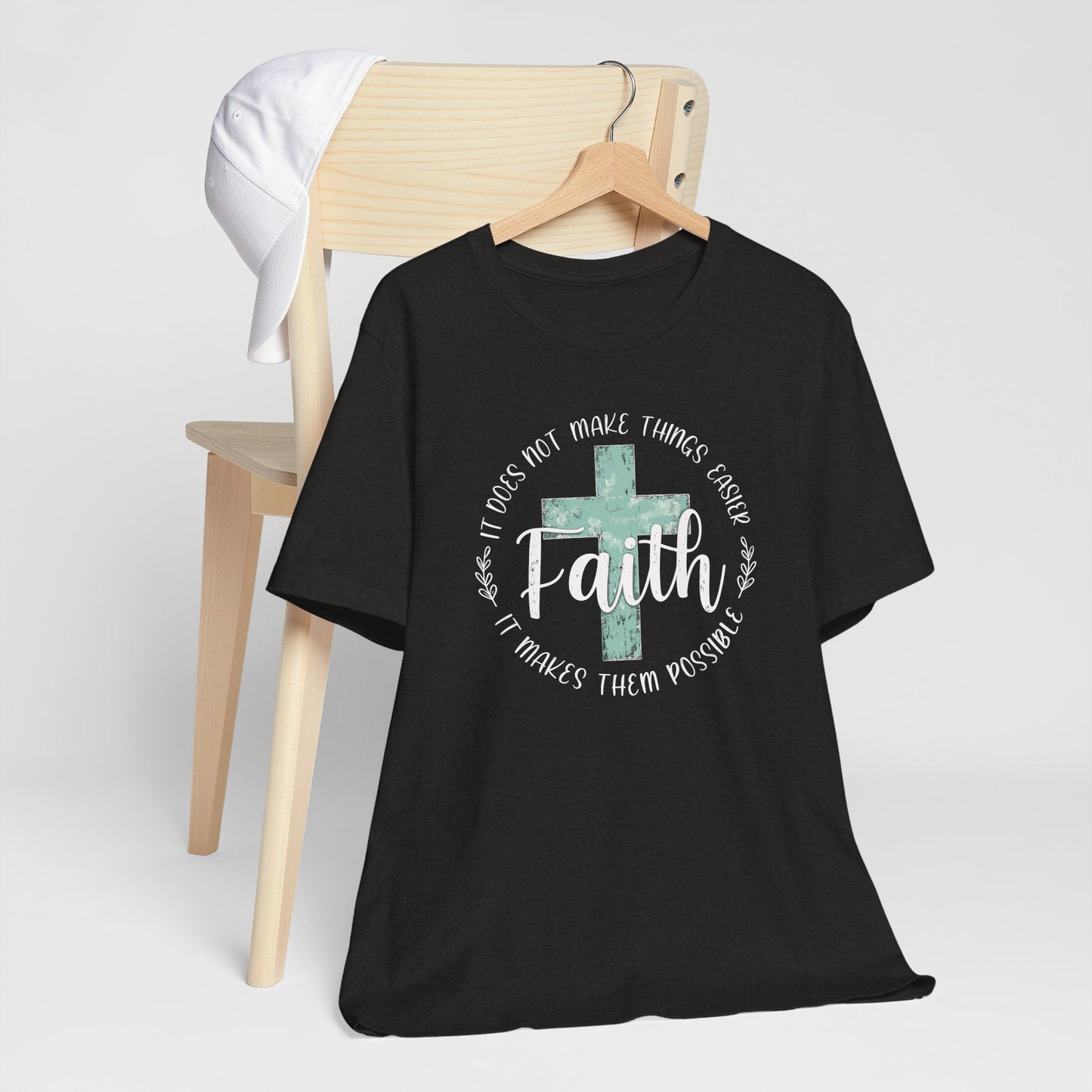 Woman wearing Faith Over Fear T-Shirt with distressed cross design and inspirational Christian message