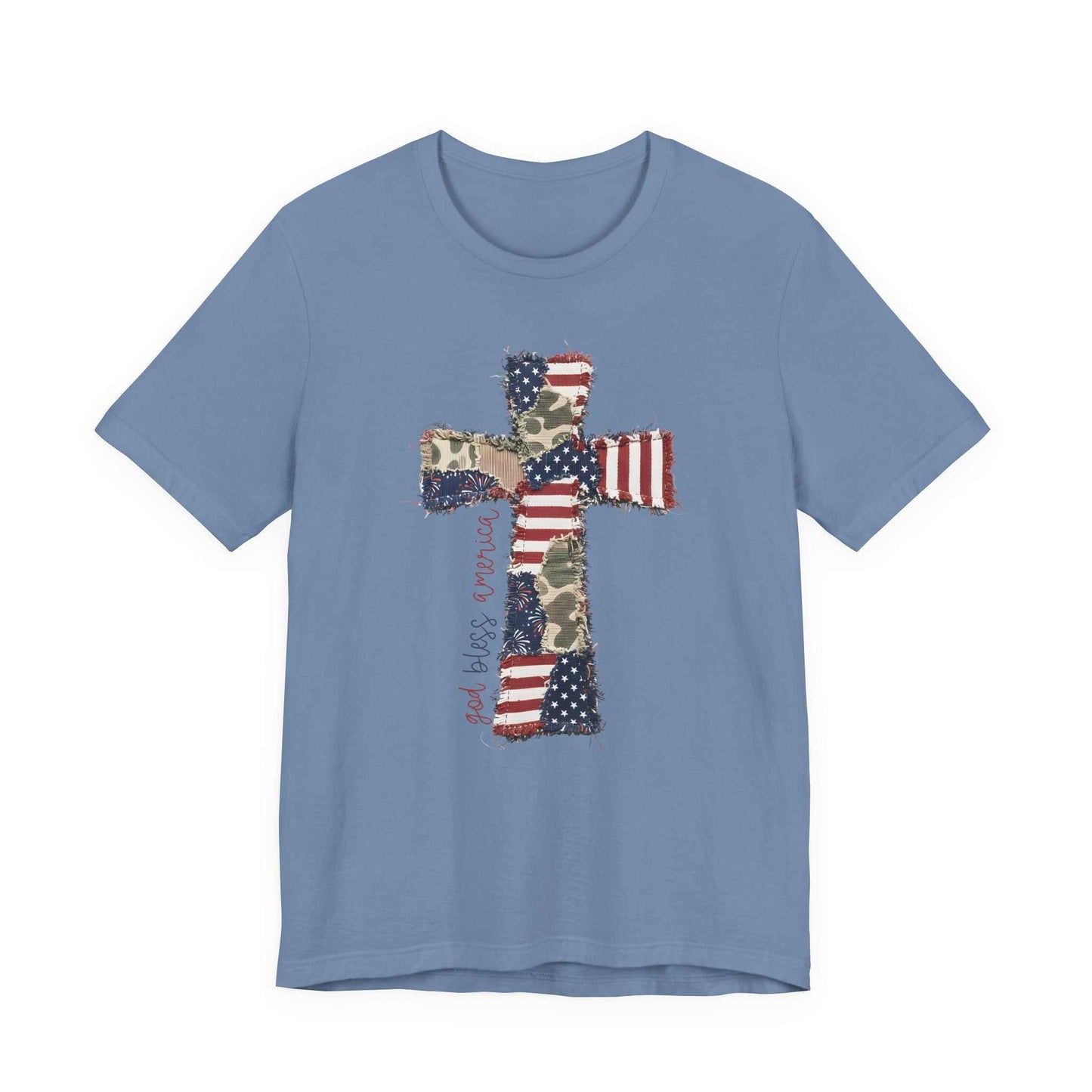 God Bless America shirt with patriotic cross graphic, distressed American flag, vintage patchwork, camouflage accents, and western boutique style.