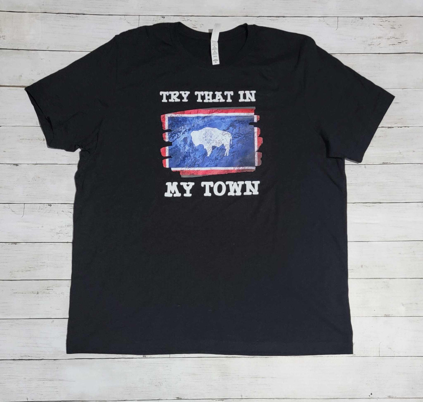 Try That In My Town Wyoming Flag Shirt featuring Wyoming flag design on a black tee.