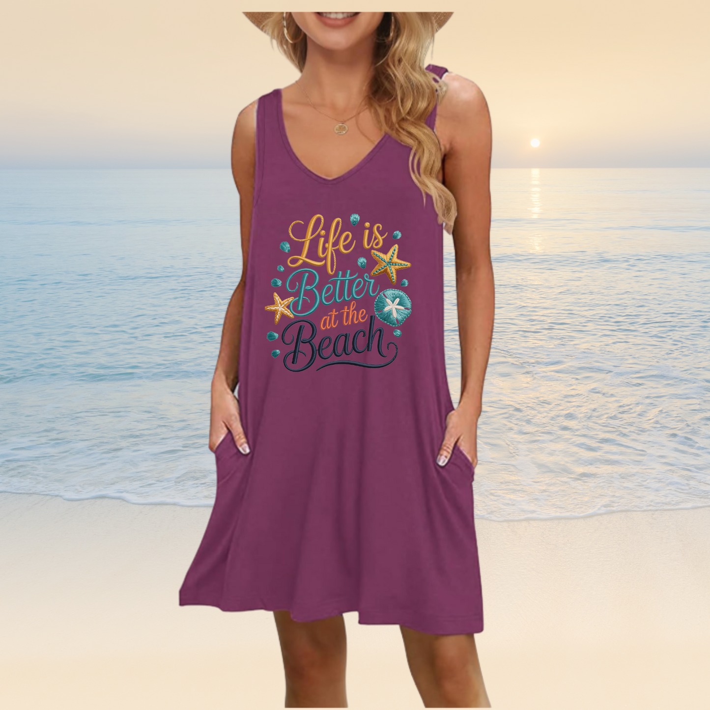Woman wearing a wine colored dress with 'Life is Better at the Beach' text