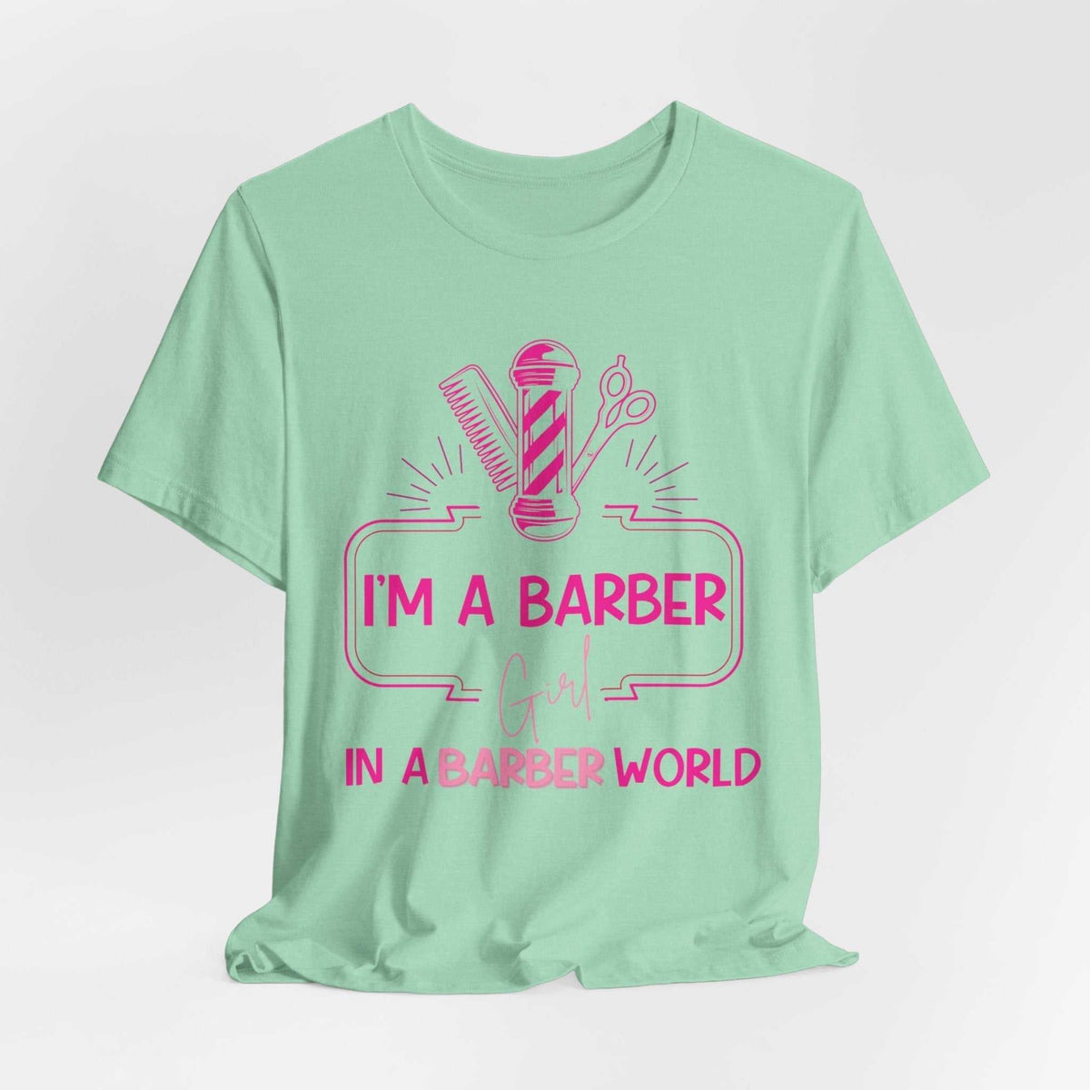 Barber Girl Tee, mint green cotton-blend shirt with bright pink barber pole, comb, shears and slogan graphic