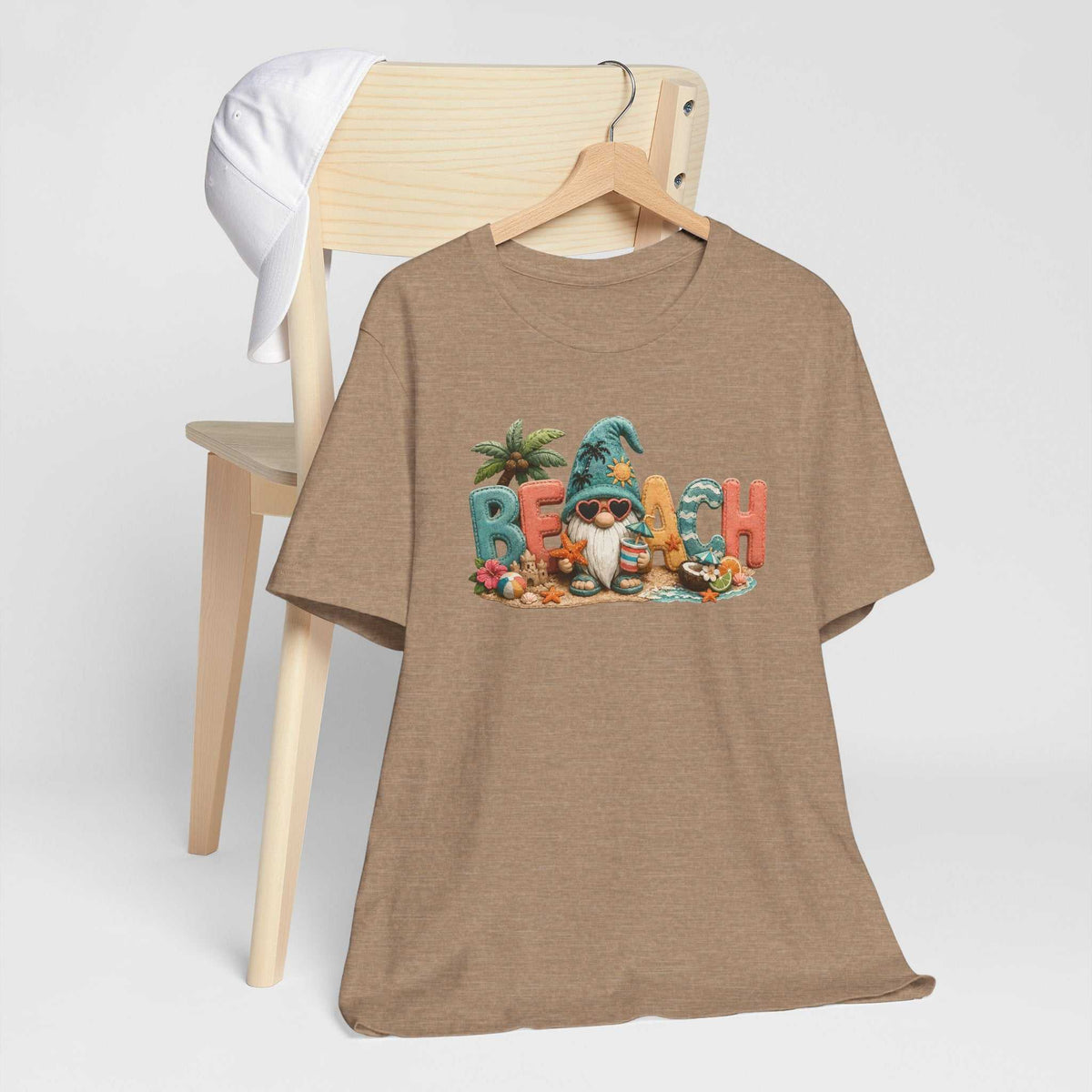 beach t shirts for women tan heather short sleeve tee with a colorful beach gnome and tropical patchwork lettering