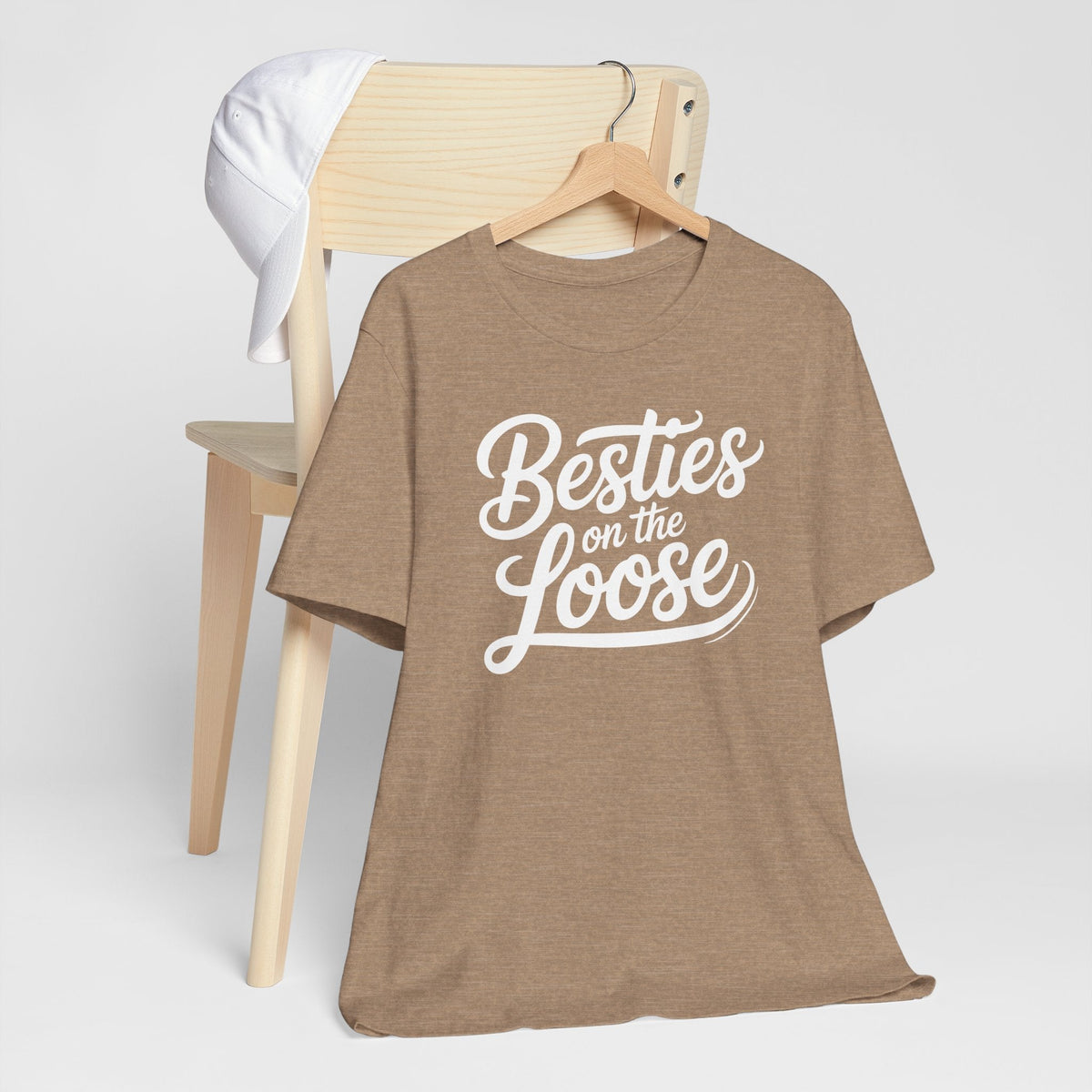 best friend funny tshirt in heather brown, soft fabric with bold white “Besties on the Loose” script graphic