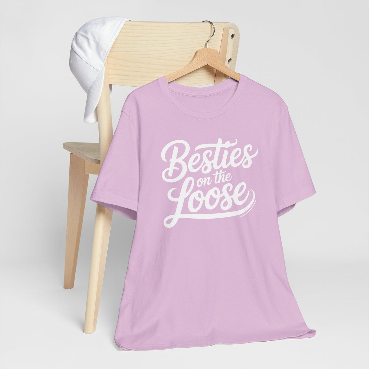 Best friend funny tshirt in lavender cotton with short sleeves and white “Besties on the Loose” script graphic