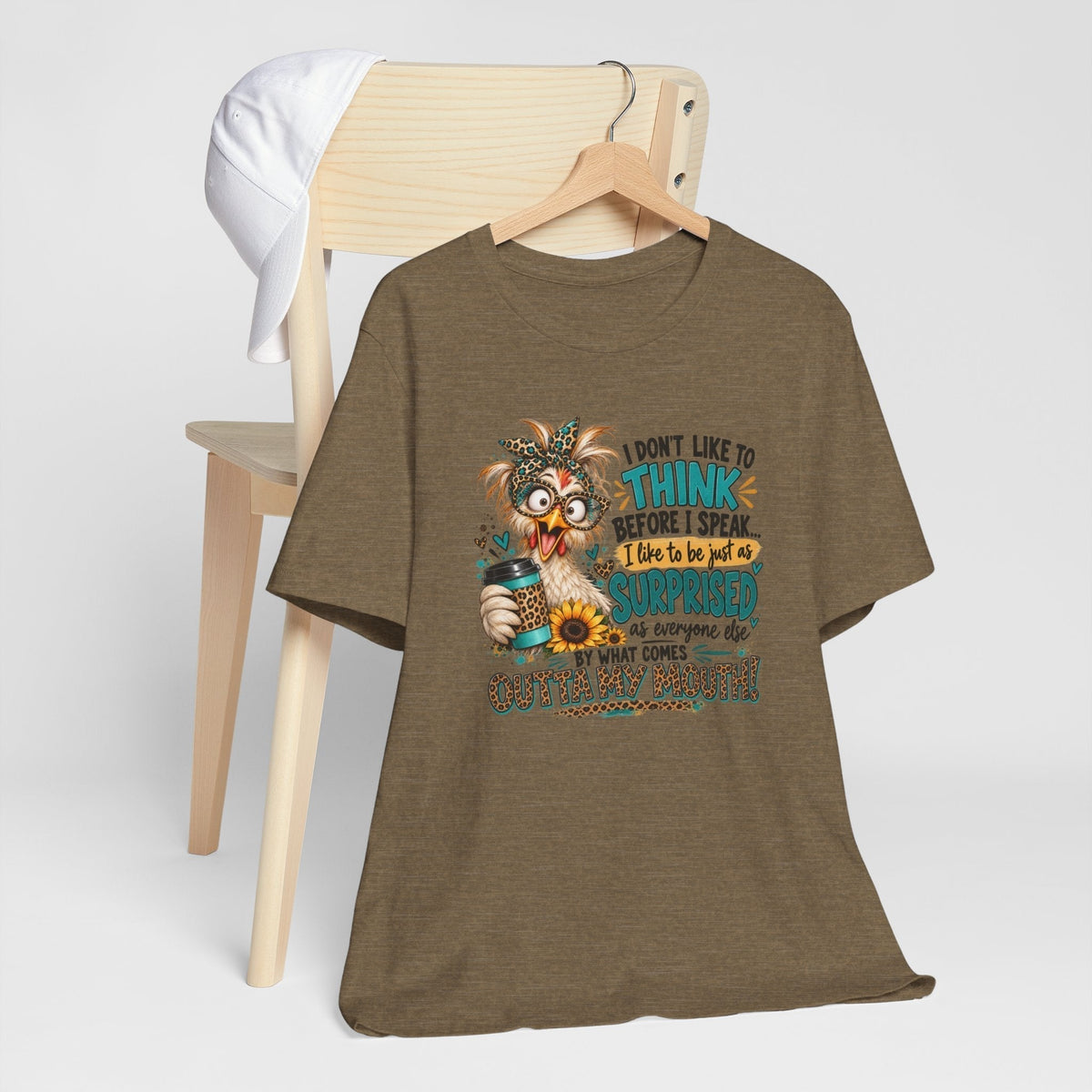 Chicken shirts funny: brown cotton tee with a colorful, wide-eyed chicken in glasses holding coffee beside a humorous quote
