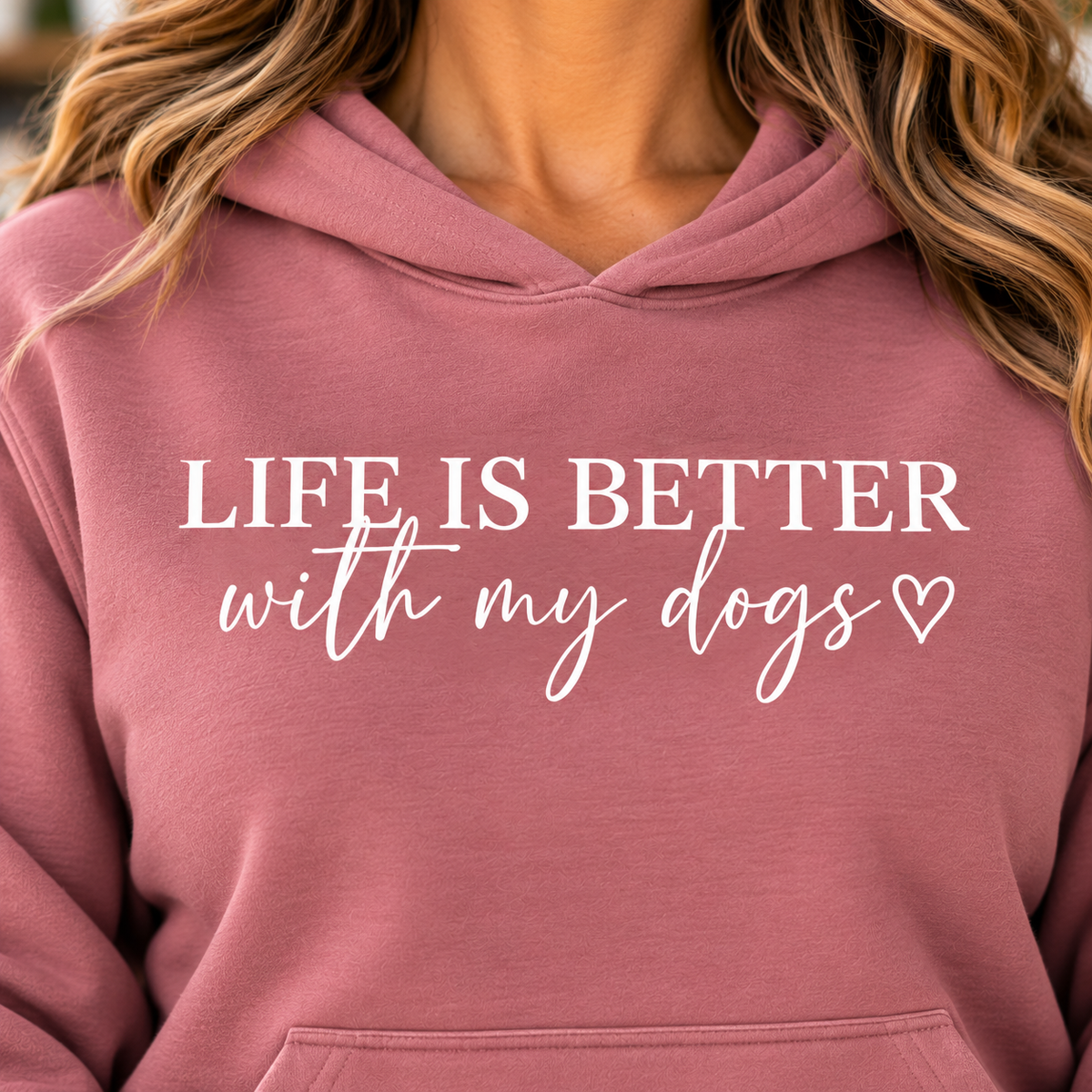 dog mom tshirt in dusty rose fabric with white “Life Is Better With My Dogs” lettering and a heart on a pullover hoodie