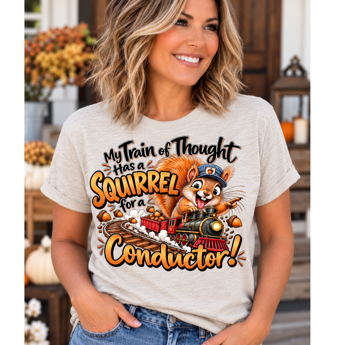 Funny animal shirt in light heather gray with colorful squirrel conductor and train graphic with playful lettering
