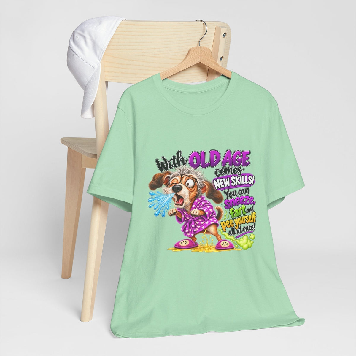 Funny old age tshirt, a mint green cotton tee with colorful text and a frazzled cartoon dog graphic