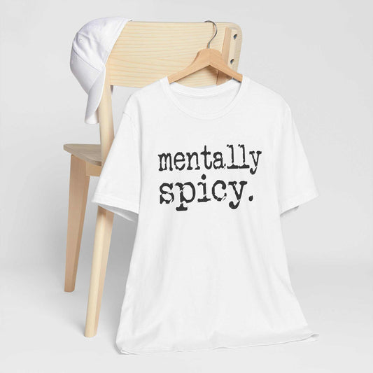 Funny tee shirts white cotton crewneck T-shirt with bold black distressed lettering reading “mentally spicy.”