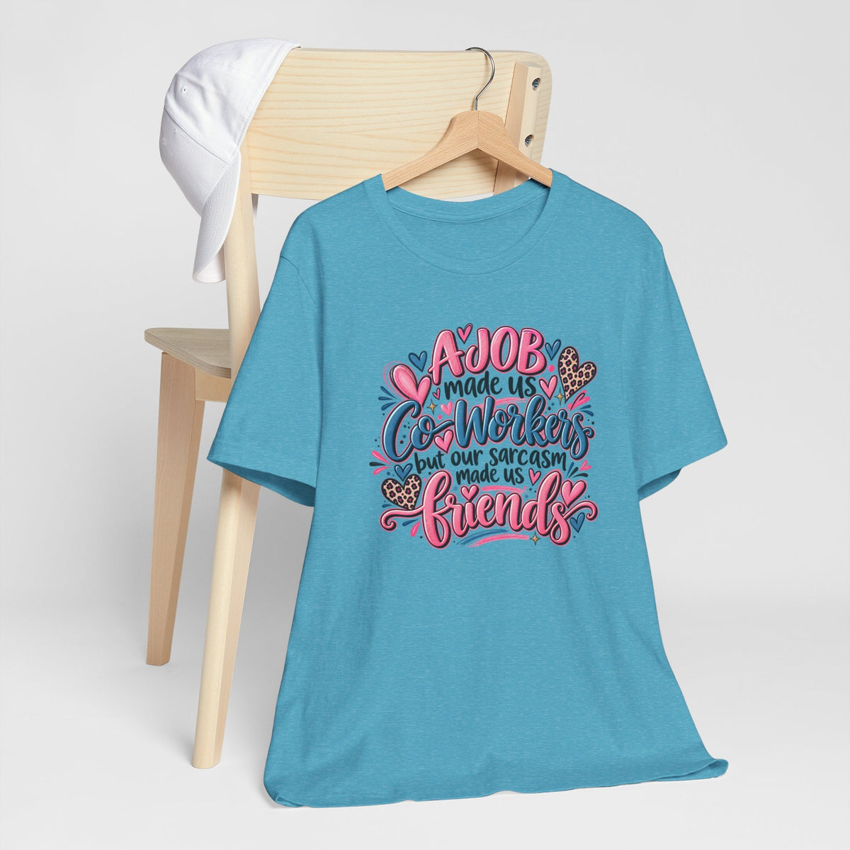 Gift ideas for coworkers blue crew-neck T-shirt with a colorful sarcastic coworkers-to-friends message and heart details