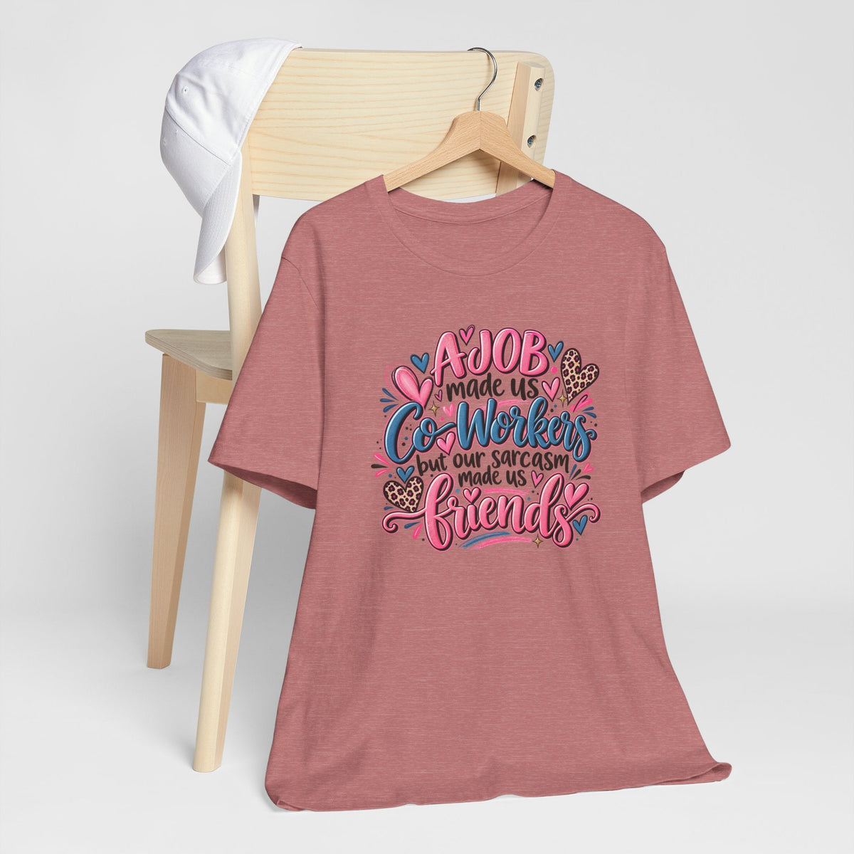 T-shirt in dusty rose cotton with colorful hand-lettered coworker sarcasm message and decorative hearts, gift ideas for coworkers
