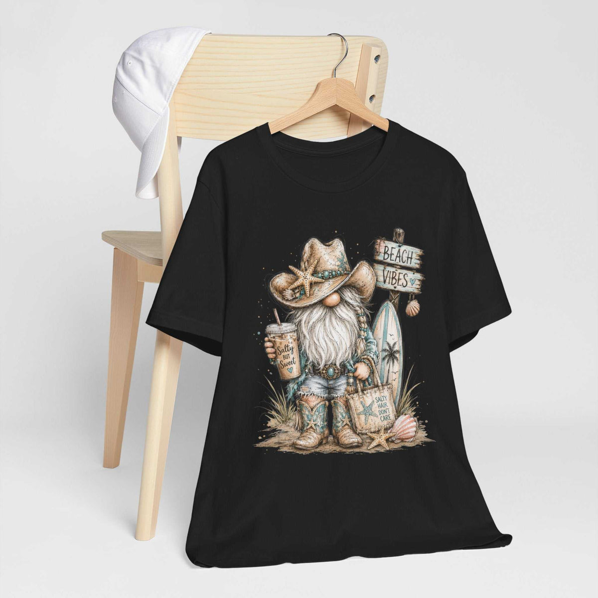 gnome t shirts: black short-sleeve tee with a watercolor beach gnome wearing a starfish cowboy hat and boots