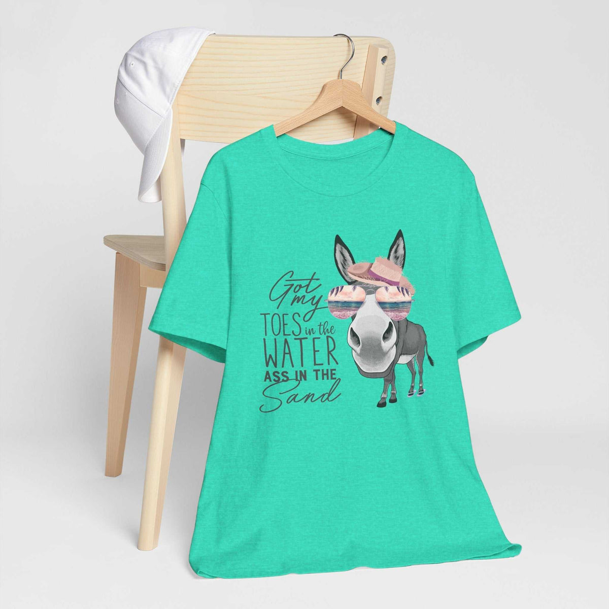 Got My Toes in the Water tee in turquoise cotton, featuring a cheeky donkey in a pink hat and sunglasses