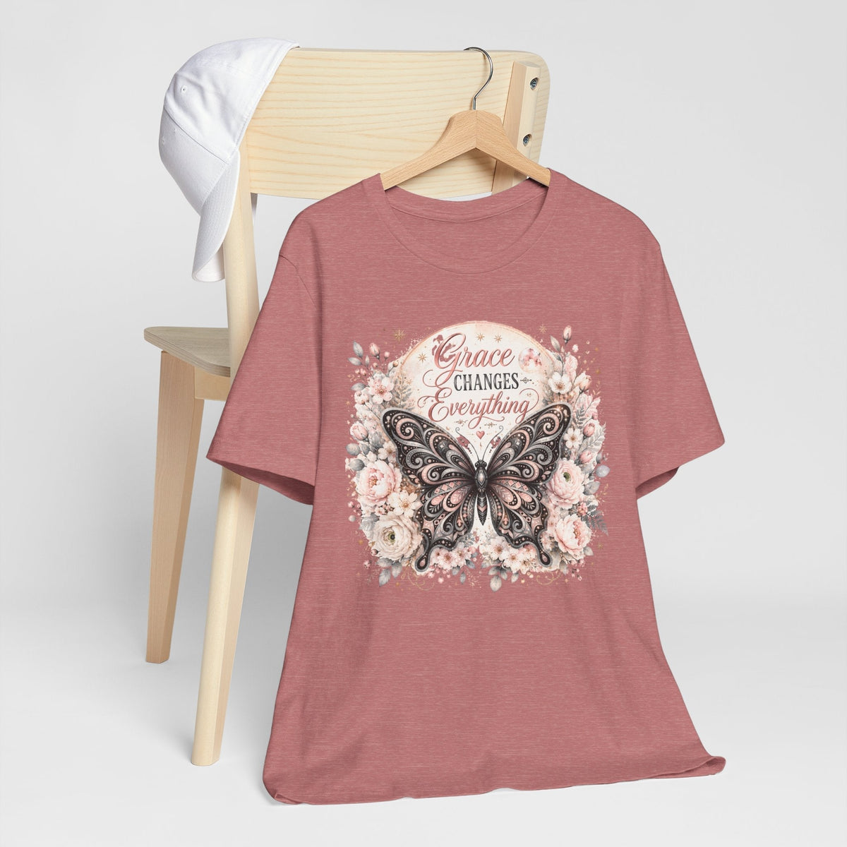 Grace Changes Everything T-shirt in dusty rose cotton with an ornate butterfly, blush florals, and inspirational lettering