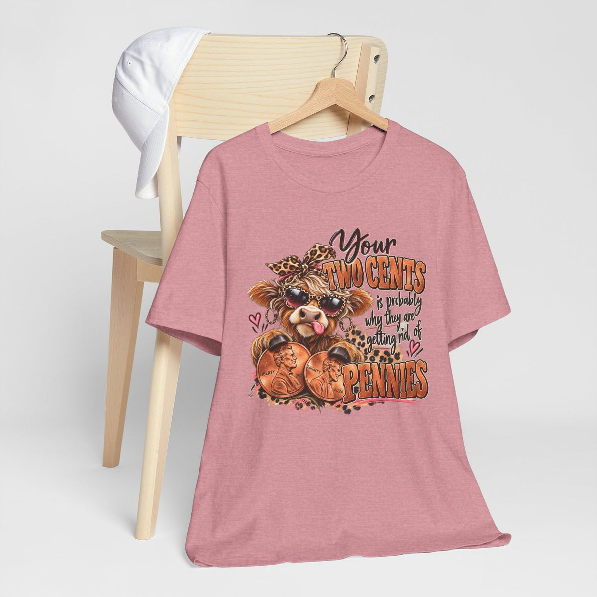 highland cow funny T-shirt in dusty pink cotton with a colorful cow graphic and cheeky pennies slogan