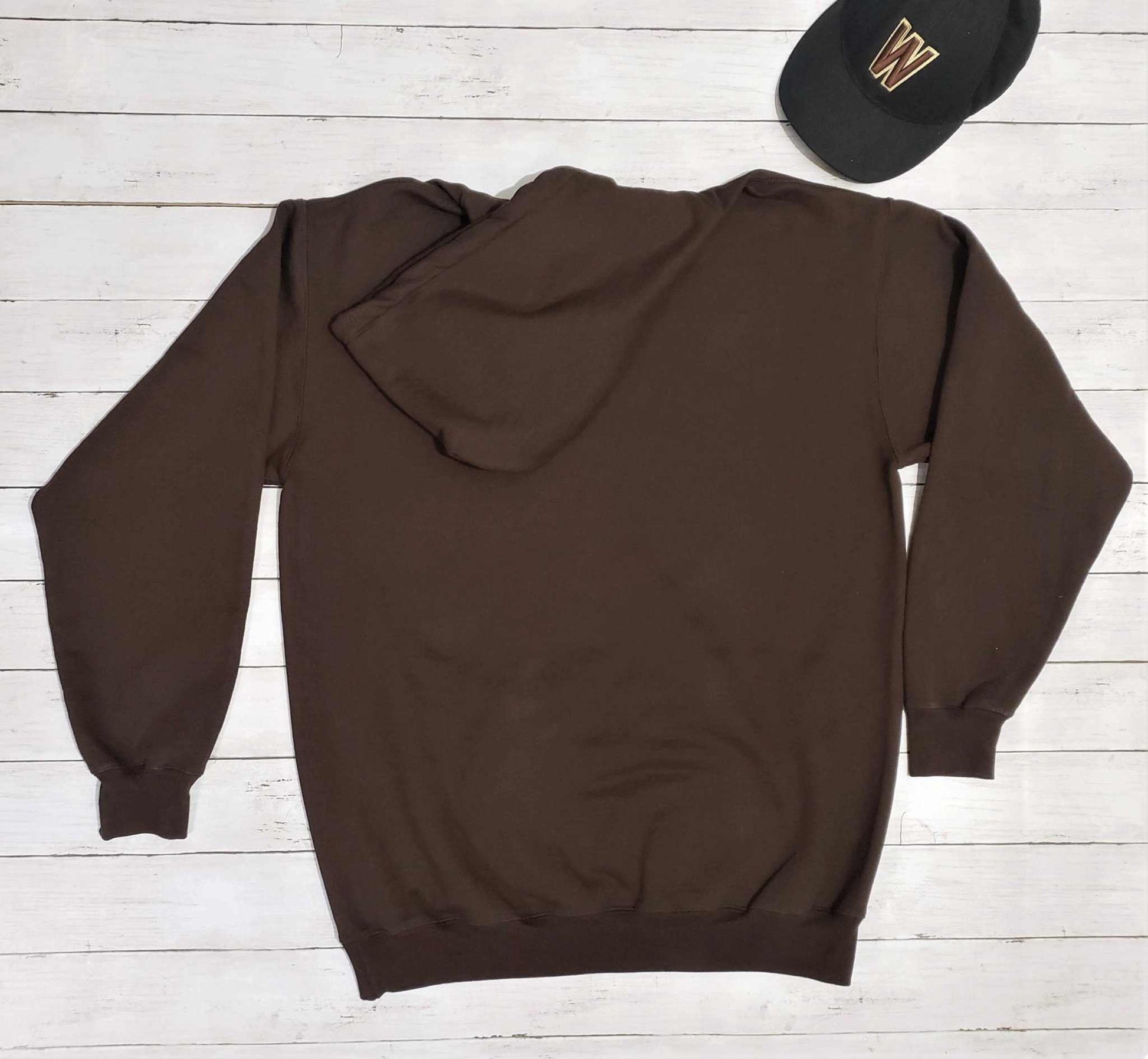 University of Wyoming Cowboys sweatshirt featuring the bucking horse logo, in chocolate color, unisex hoodie for fans.