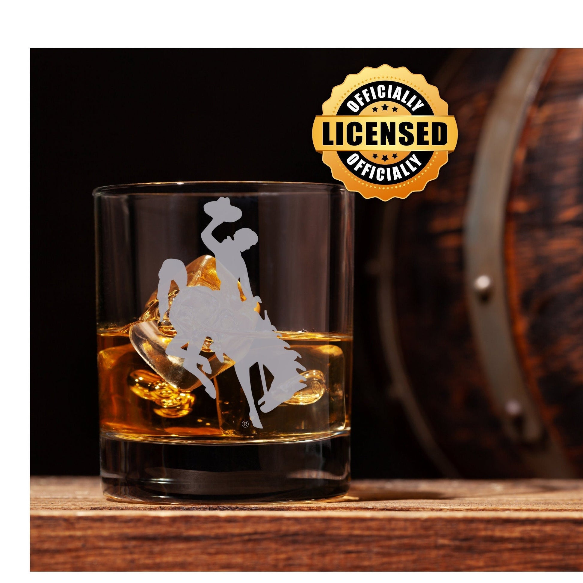 Wyoming Whiskey Glass with hand-etched University of Wyoming Cowboys logo, officially licensed, showcasing style and durability for whiskey enthusiasts.