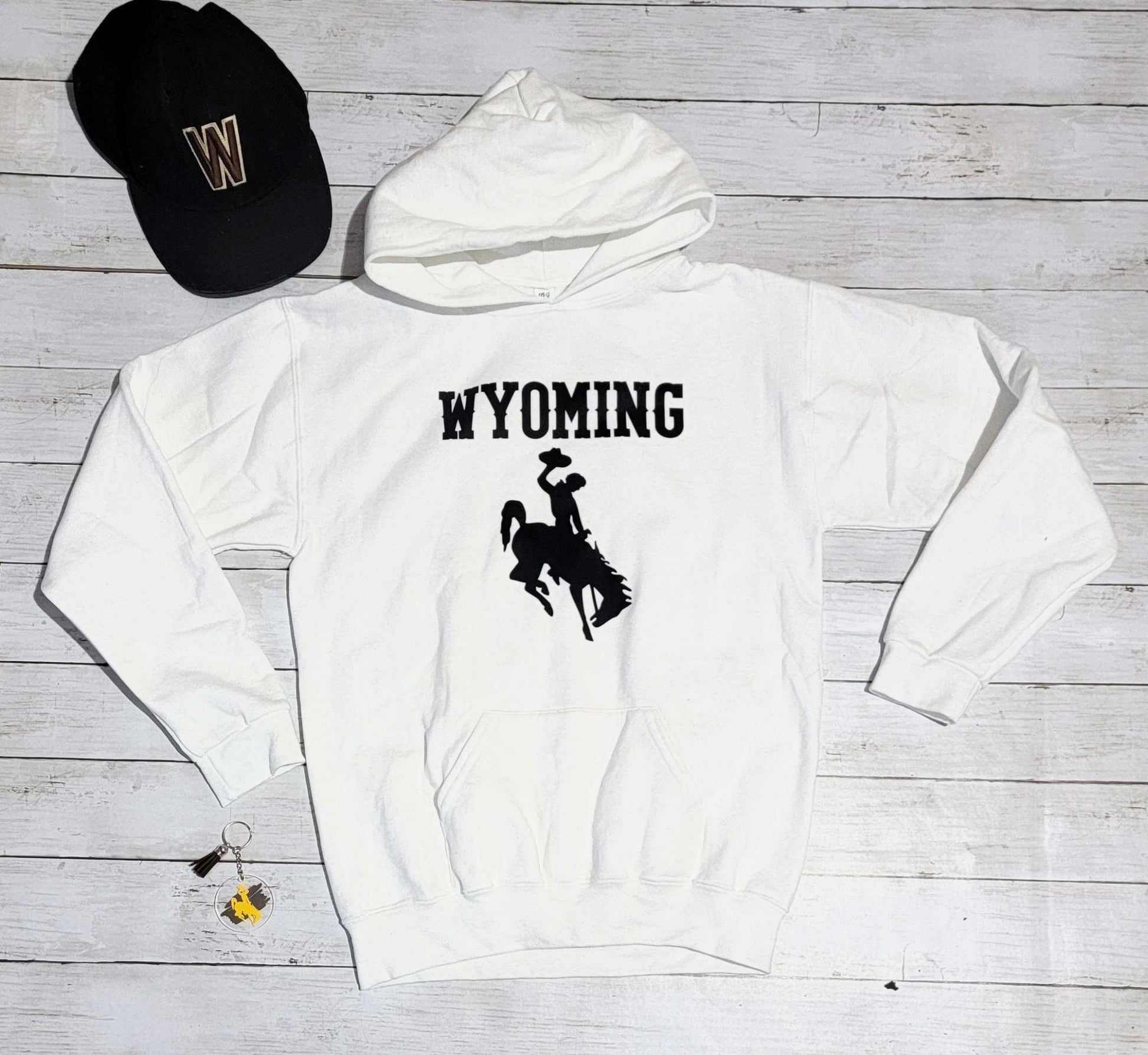 Wyoming Cowboys Youth Apparel white hoodie with bucking horse and Wyoming text.