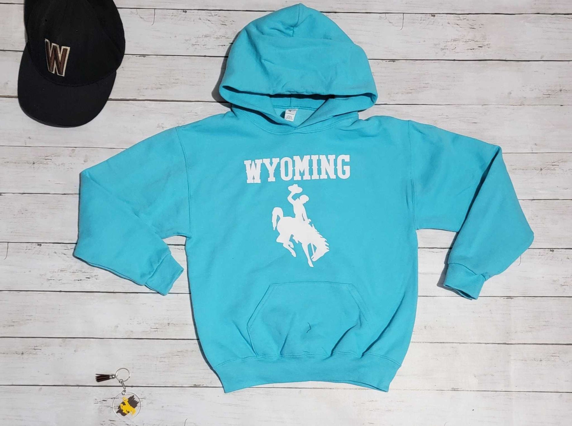 Wyoming Cowboys Youth Apparel hoodie with bucking horse logo.