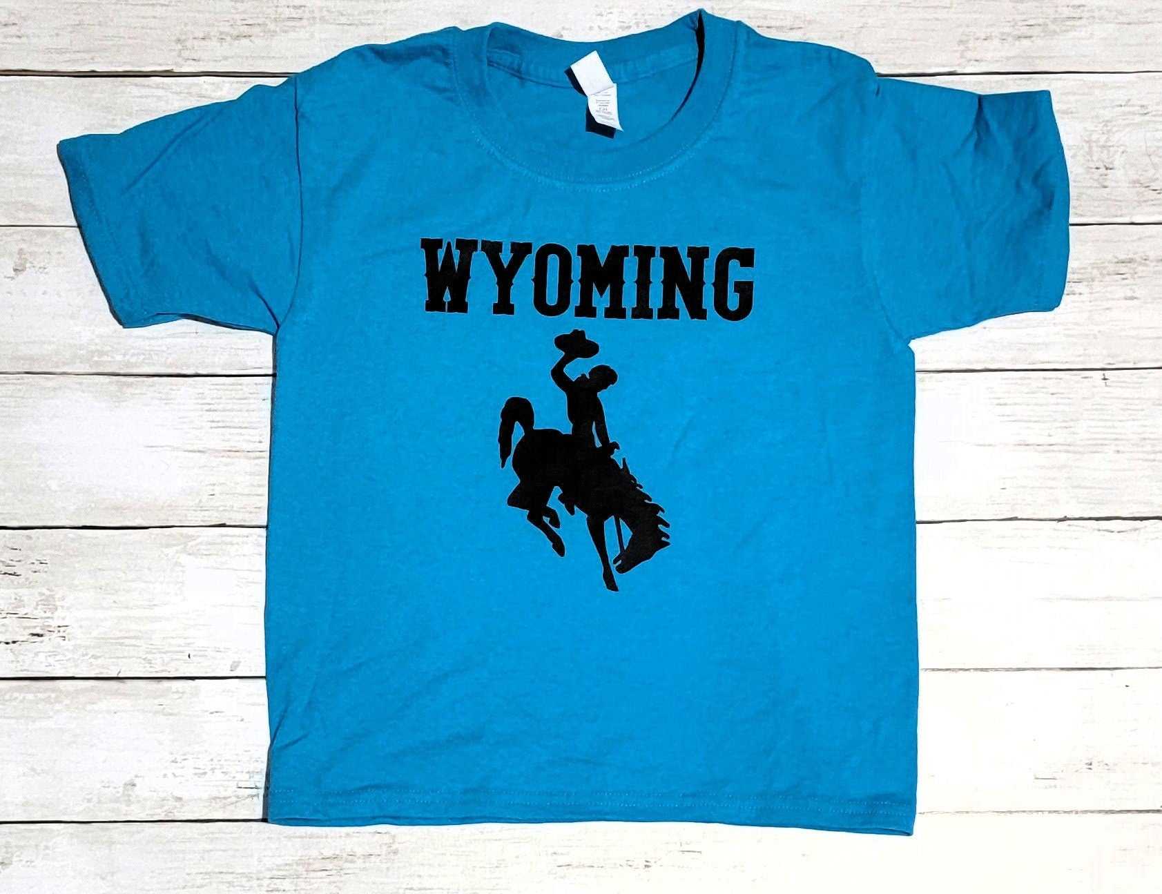 Wyoming Cowboys youth apparel blue t-shirt with black logo.
