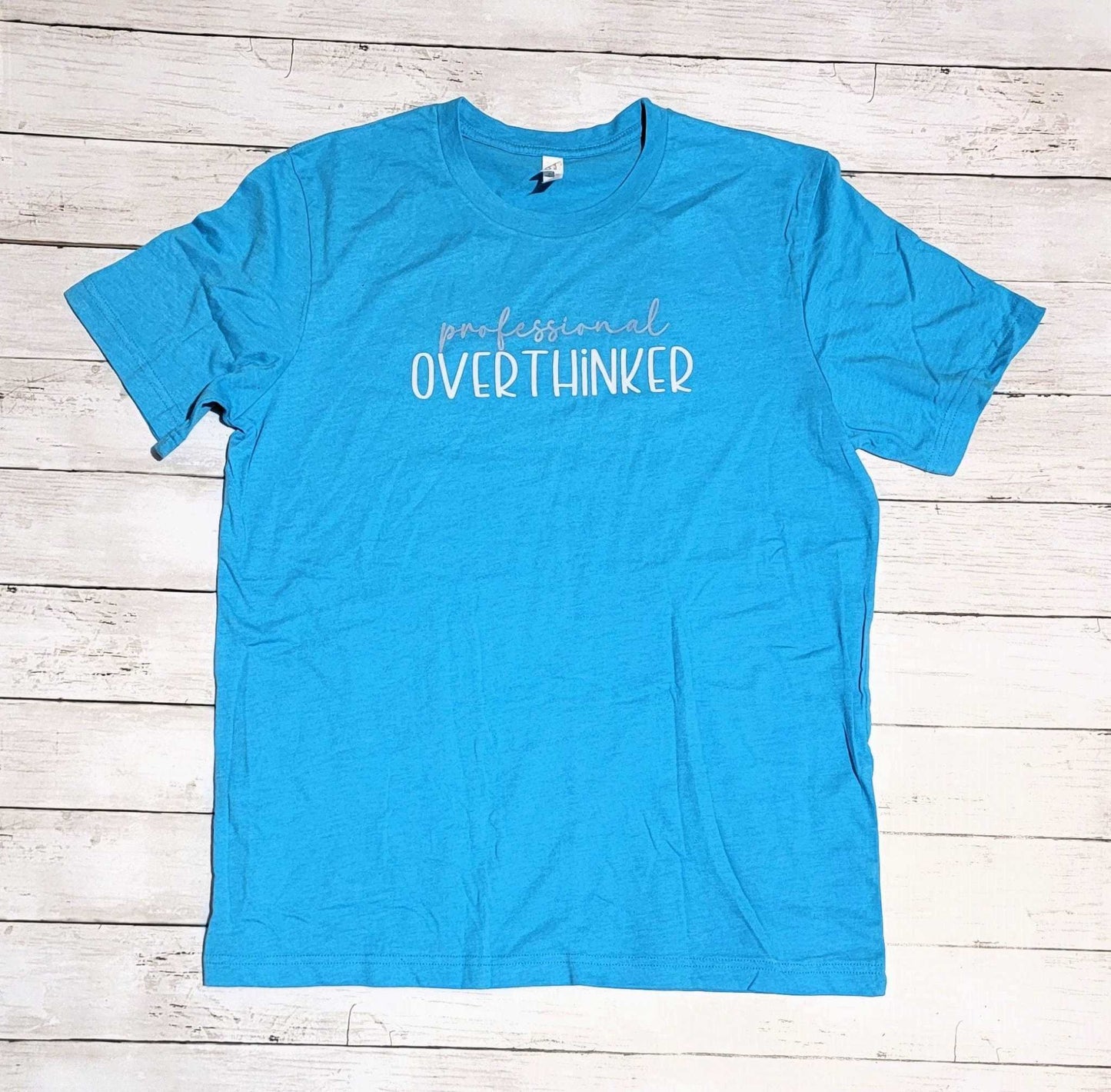 Professional Overthinker shirt in Heather Aqua, perfect gift for overthinkers.