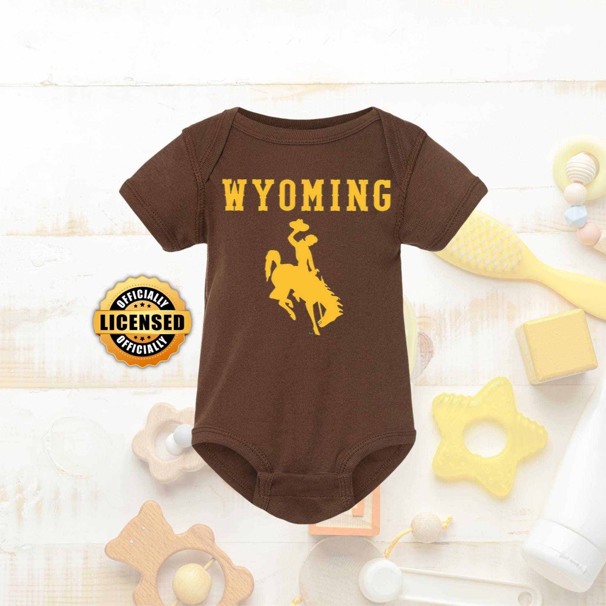 Wyoming Cowboy Onesie for infants in brown with iconic cowboy design.