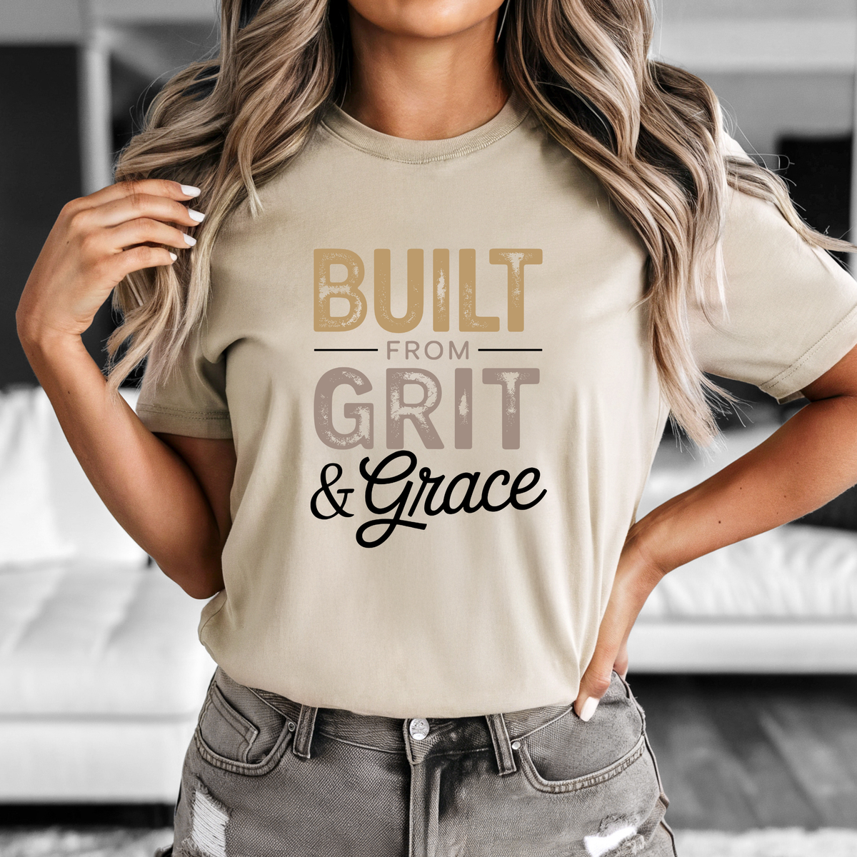 Inspirational tees for ladies: natural beige cotton-blend tee with a distressed tan, taupe and black “Built from Grit & Grace” graphic