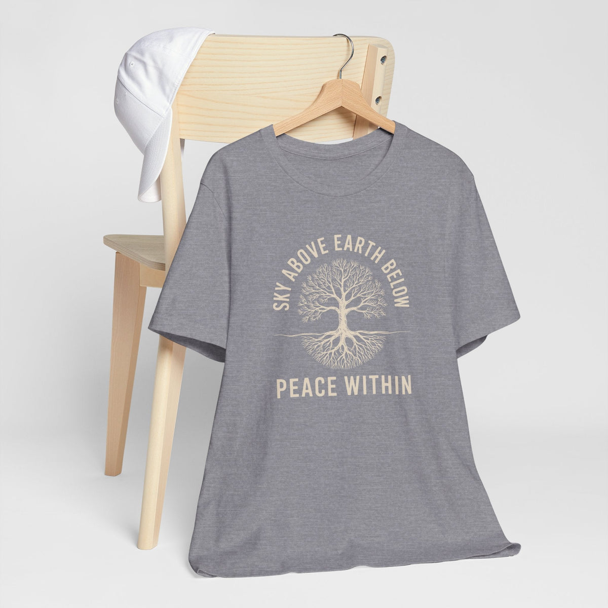 nature inspired tshirt in heather gray cotton blend with cream rooted tree graphic and “Sky Above Earth Below Peace Within” text