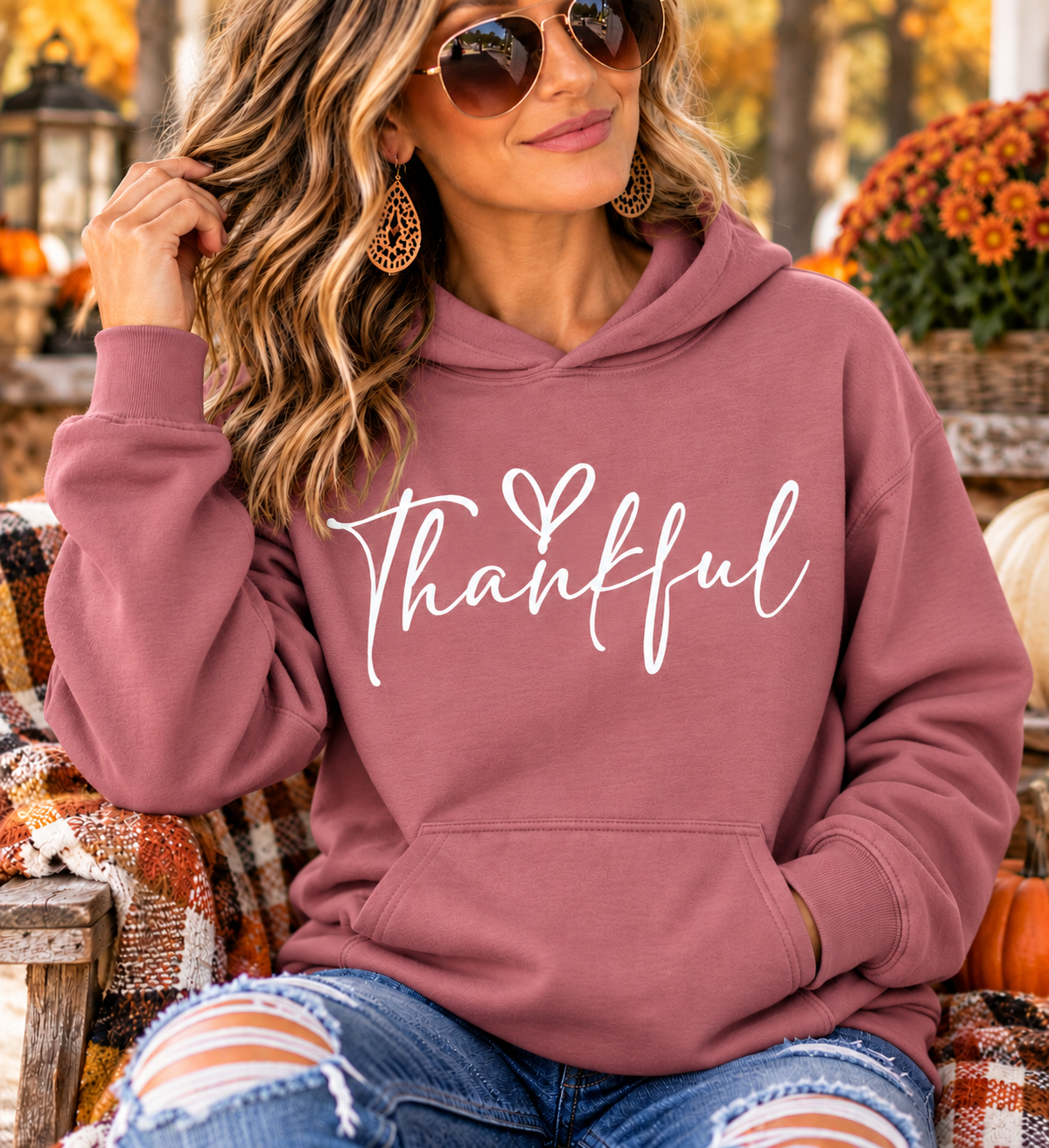 thankful sweatshirt in dusty mauve with white handwritten script and a small heart, featuring a cozy hood and front pouch pocket