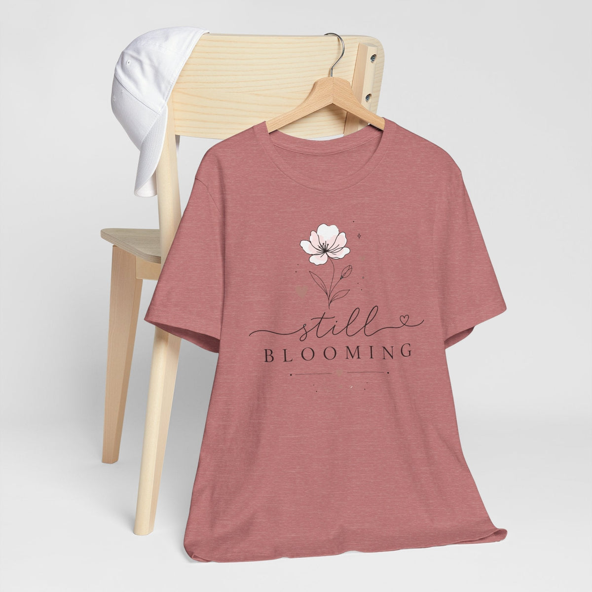 women's inspirational tshirts, dusty rose cotton tee with white floral artwork and elegant “Still Blooming” script